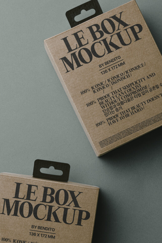 Two stacked kraft boxes with black hang tabs showing front labels