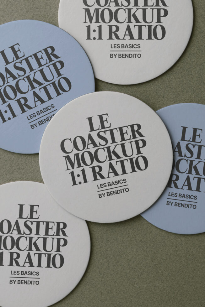 Circular coaster mockups in alternating blue, cream colors arranged on textile