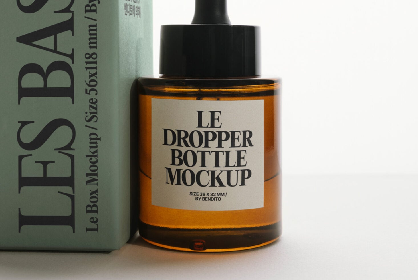 Amber dropper bottle with label displayed beside sage green box packaging