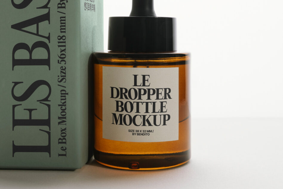 Amber dropper bottle with label displayed beside sage green box packaging