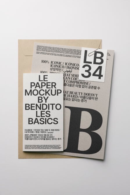 White paper mockup with dark tag on beige envelope, multilingual copy