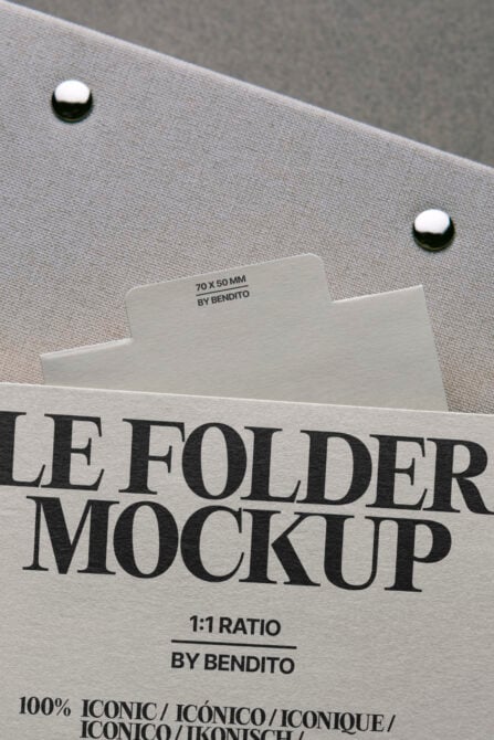 File folder mockup displaying cream labeled card with metallic fasteners visible