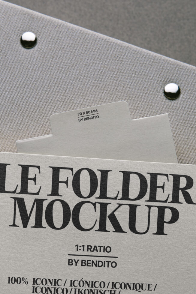 File folder mockup displaying cream labeled card with metallic fasteners visible