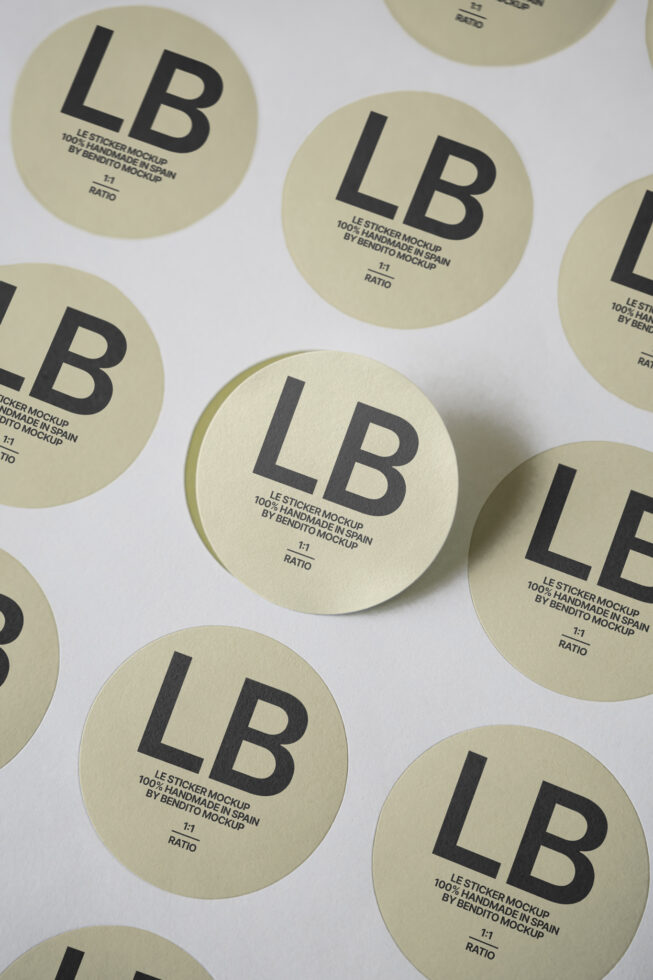 Cream circular stickers with large LB lettering scattered on white background