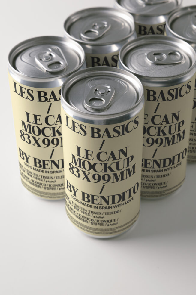 Four metallic aluminum cans with pull tabs, cream labels, black serif typography design