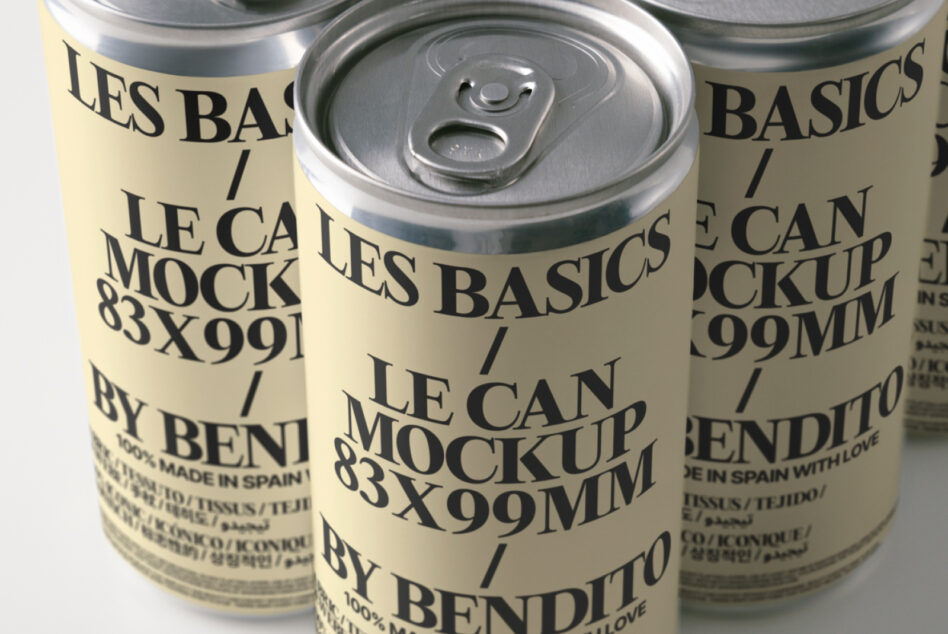 Angled view of aluminum cans with metallic finish, cream wrapping, bold sans serif branding