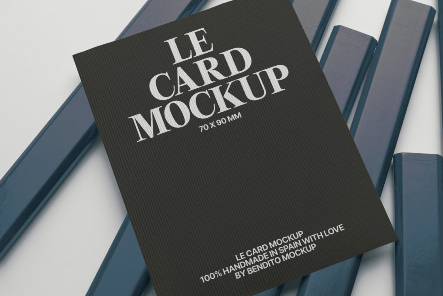 Dark textured business card mockup 70x90mm with serif typography on blue striped background