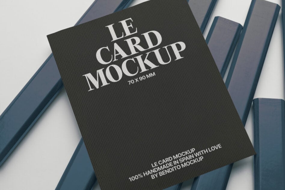 Dark textured business card mockup 70x90mm with serif typography on blue striped background