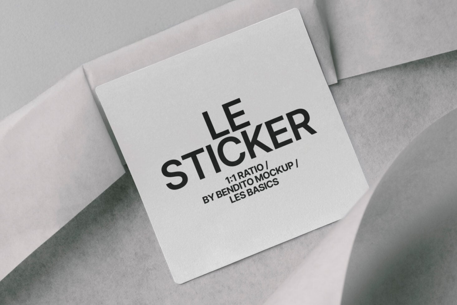 White square sticker mockup on fabric with Les Basics design detail