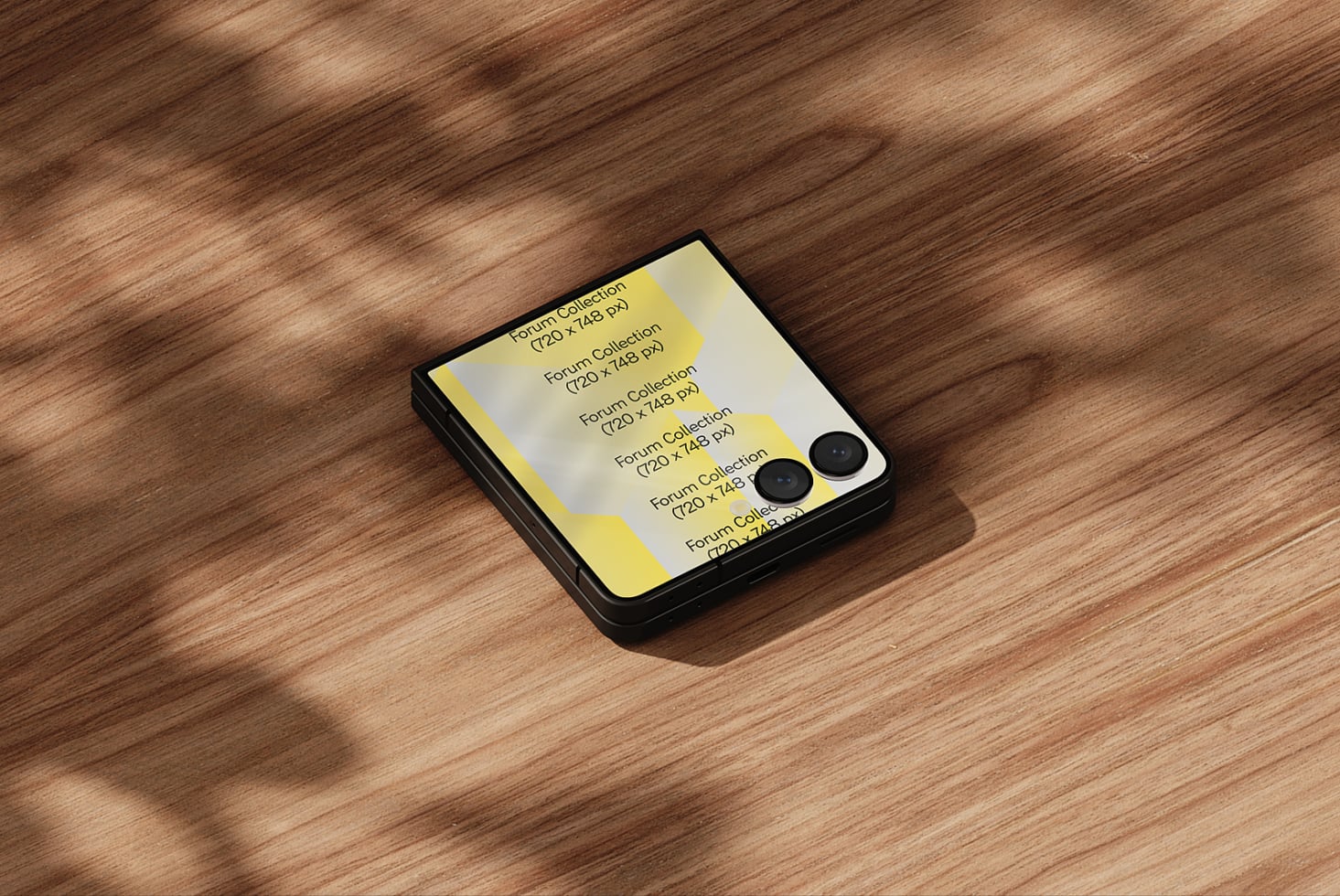 Folded phone mockup on wood surface showing yellow design with dual camera