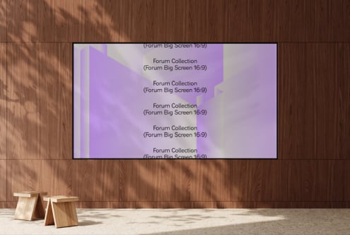 Big screen display on wood wall showing purple gradient layout with stacked text blocks mockup