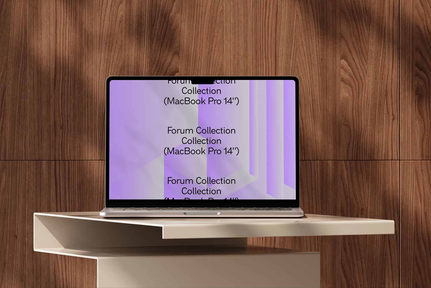 MacBook Pro 14 inch showing purple geometric design on wooden desk