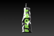 Crumpled silver tube with bright lime green text cutouts on black backdrop