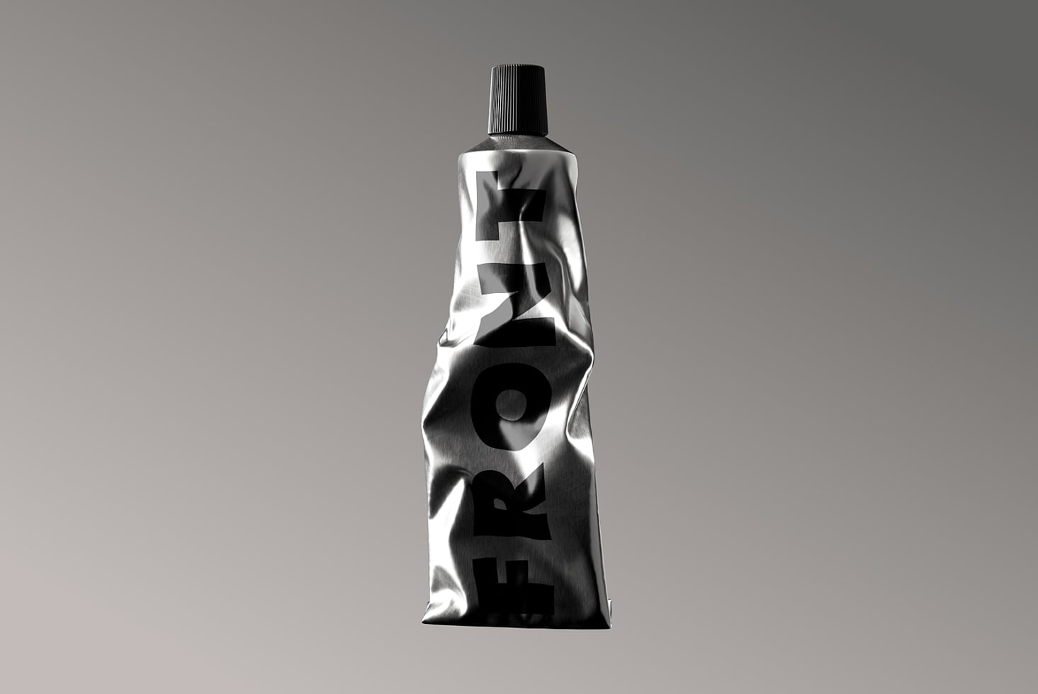 Wrinkled metallic tube with black cutout letters on gray background