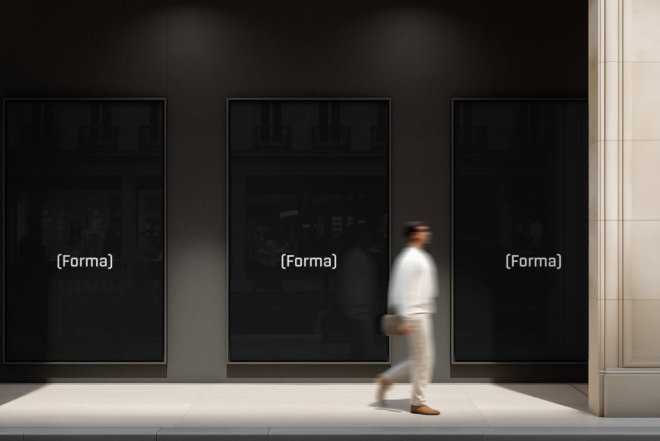 Modern gallery installation with three frames on dark wall interior