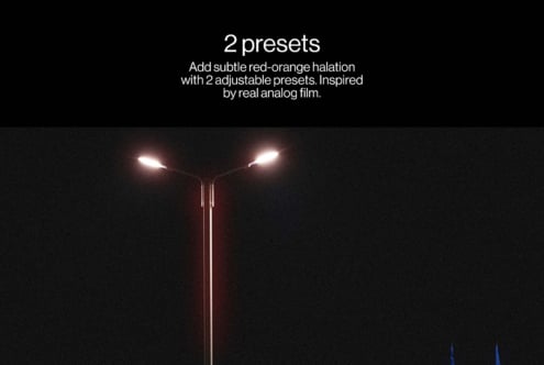 Night streetlamp glowing with red-orange halation effect against dark sky