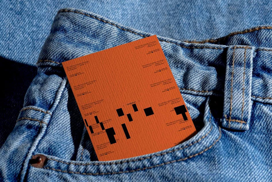 Orange label mockup displayed in blue jeans back pocket against denim