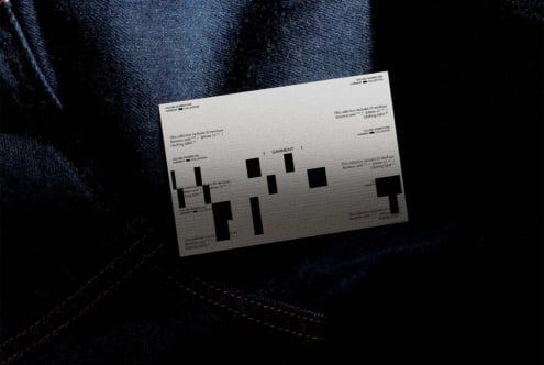 Garment collection mockup card on denim fabric displaying black text layout on neutral background