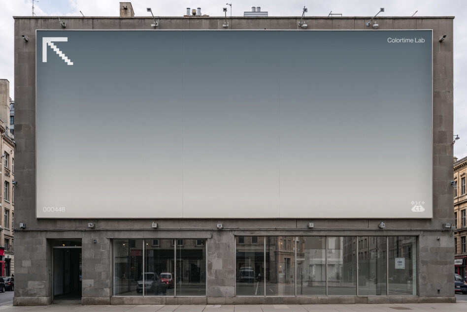 Rooftop billboard with gradient gray fade, minimal logo in corner
