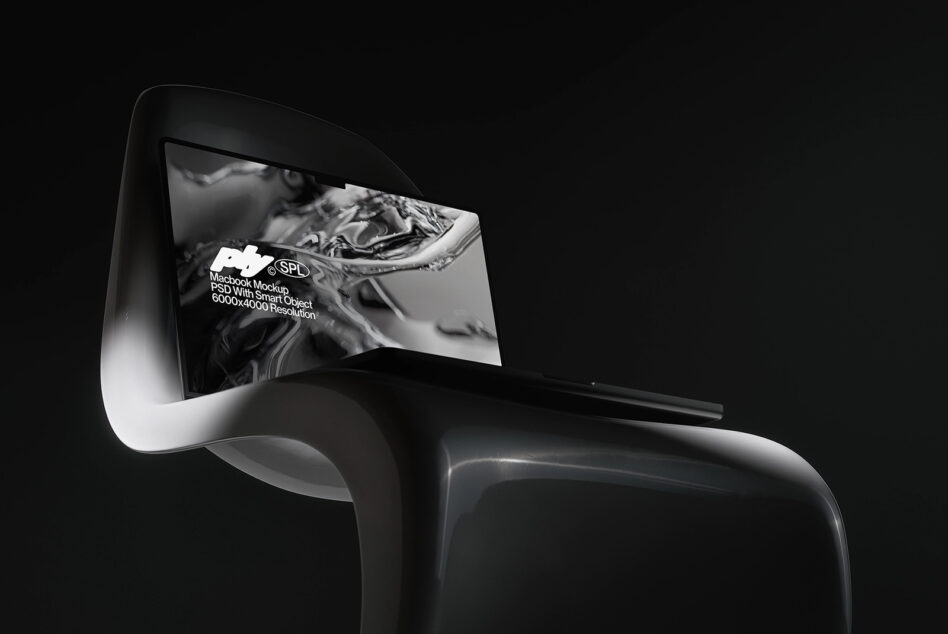 Macbook on modern chair with liquid metal texture on screen