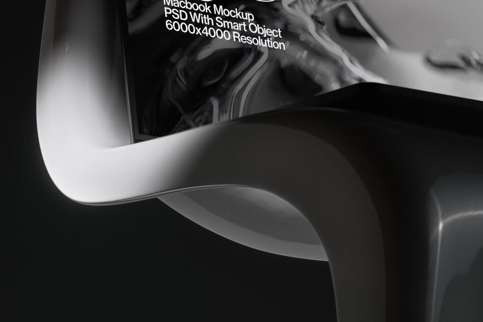 Close up of laptop display showing abstract swirling design mockup