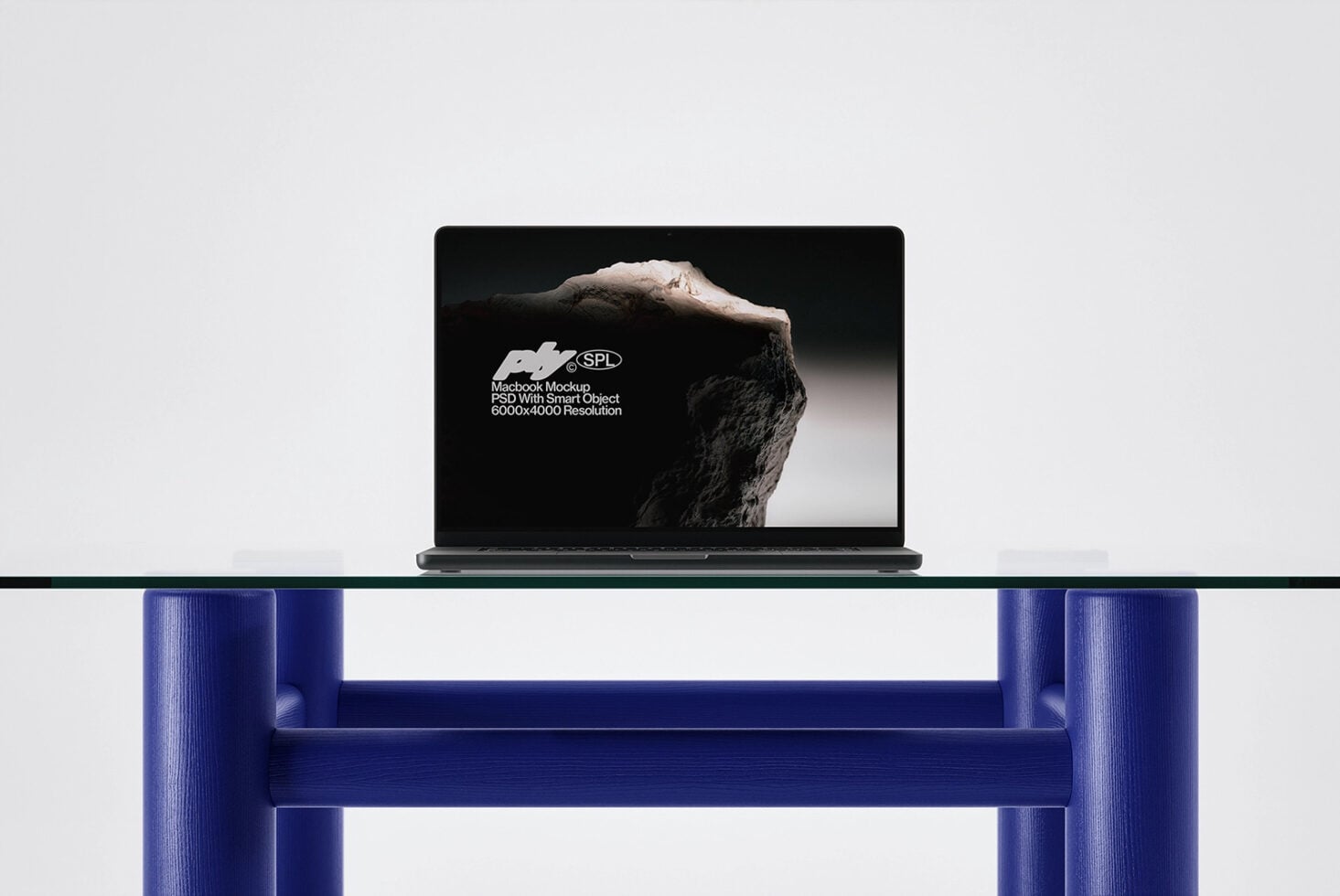 Laptop on shelf displaying mountain photography mockup with blue furniture