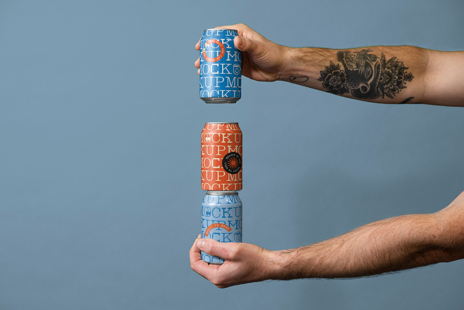 Hands stacking orange, white, blue cans with repeating text mockup layouts