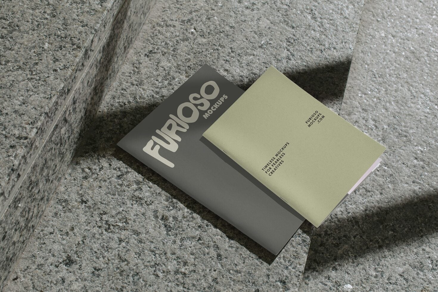 Gray mockup card with cream text next to pale yellow card on concrete