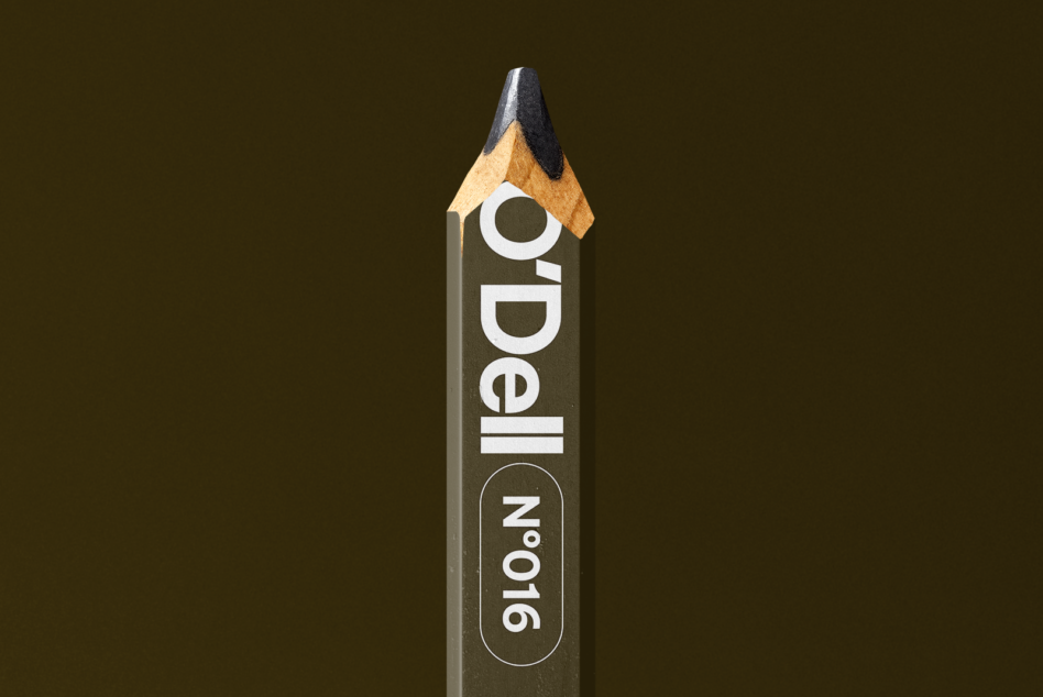 Wooden pencil mockup with O'Dell branding label against olive textured backdrop