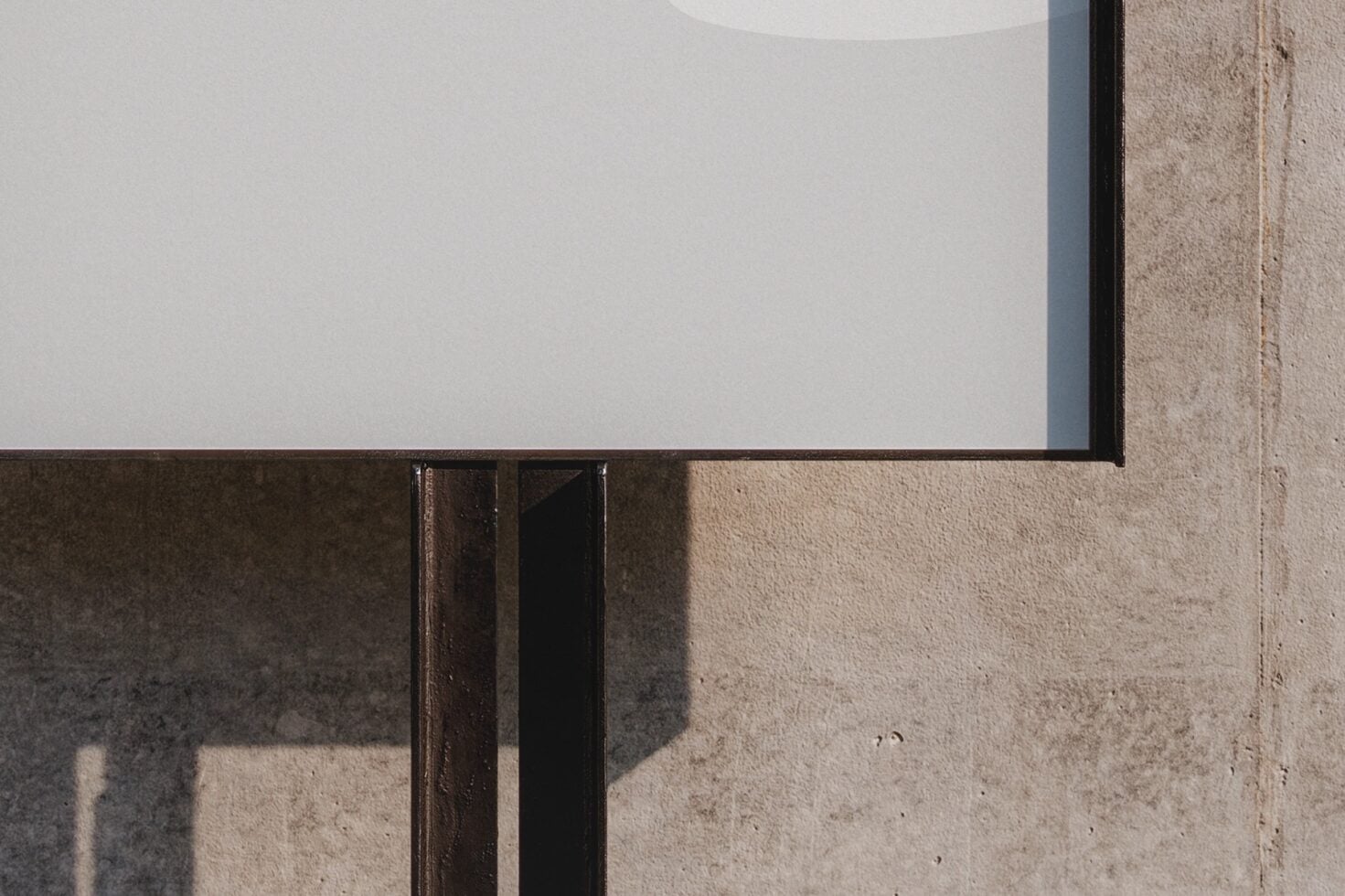 Blank poster mockup mounted on concrete wall with shadow in daylight