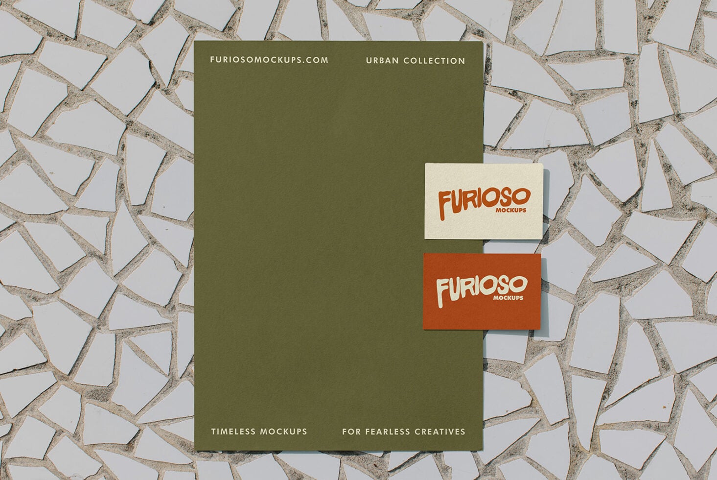 Stationery set with business cards on olive poster flatlay