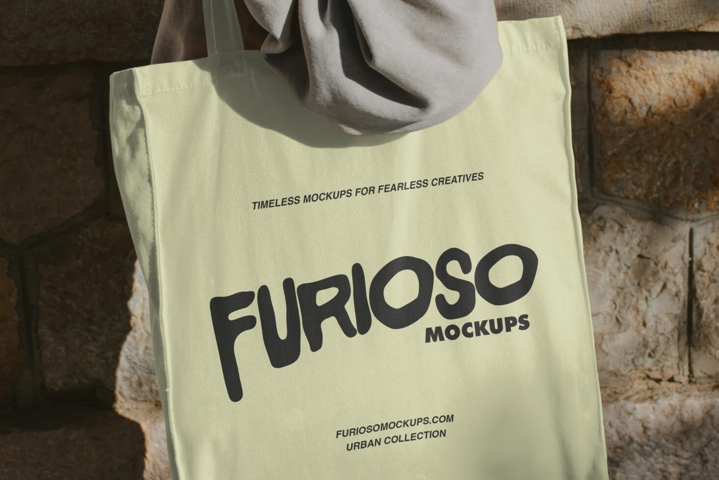 Pale yellow canvas tote showing bold black FURIOSO lettering on front