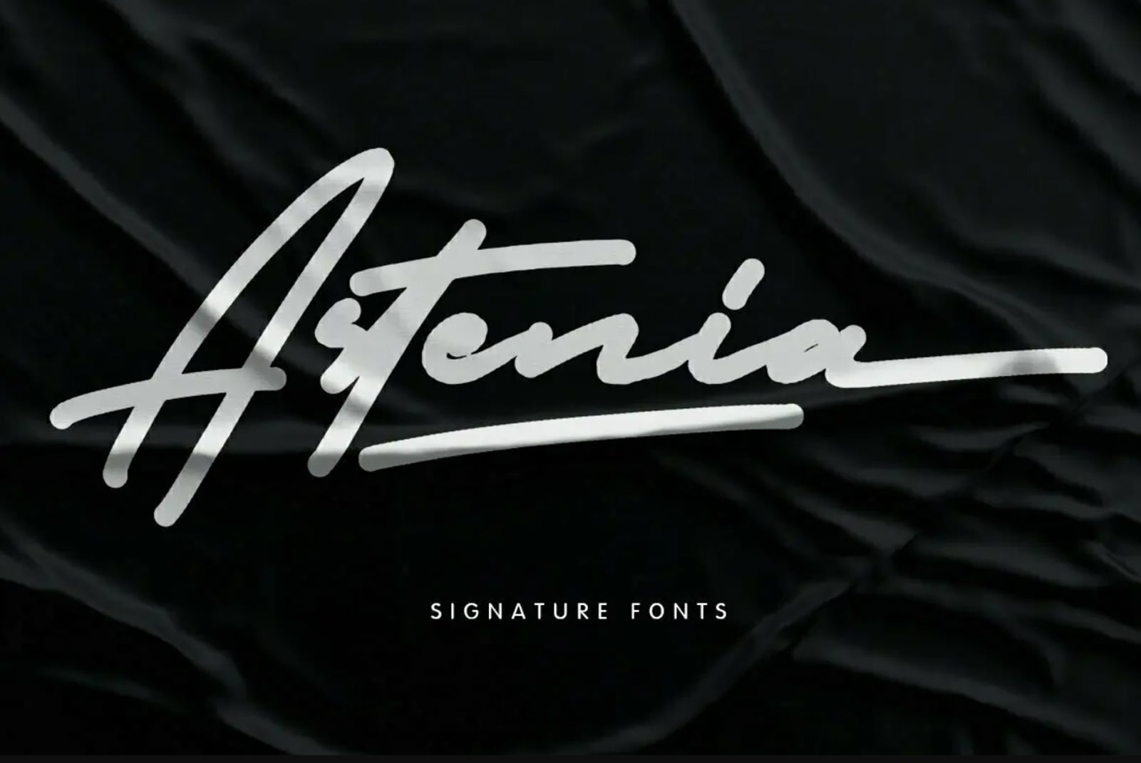 Artemisia metallic signature font collection on black fabric texture