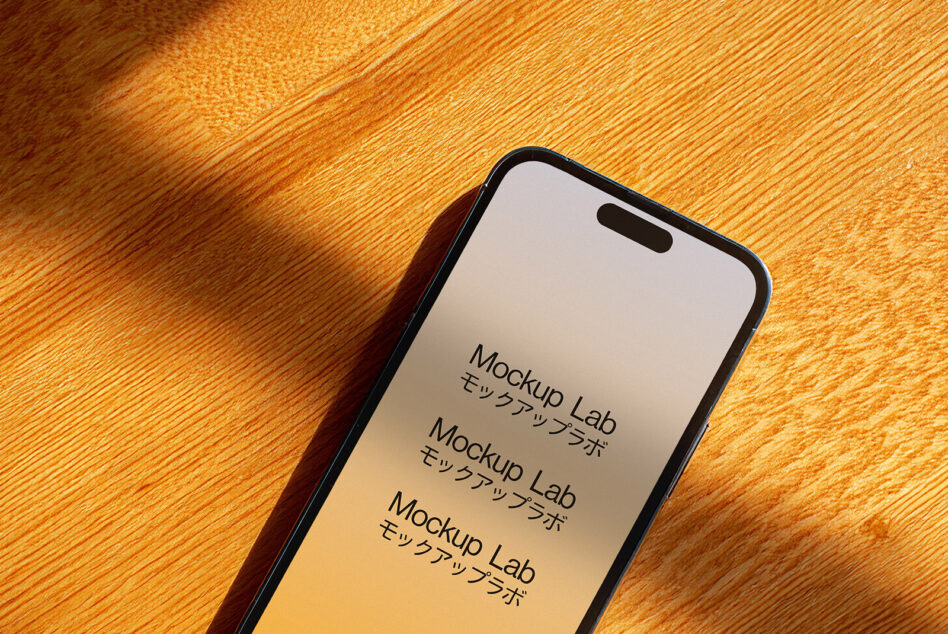 Black iPhone displaying repeating text on warm gradient screen mockup