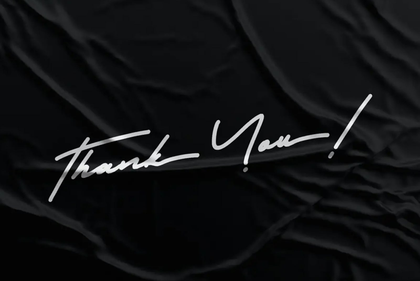 Thank you handwritten script on draped black fabric texture overlay