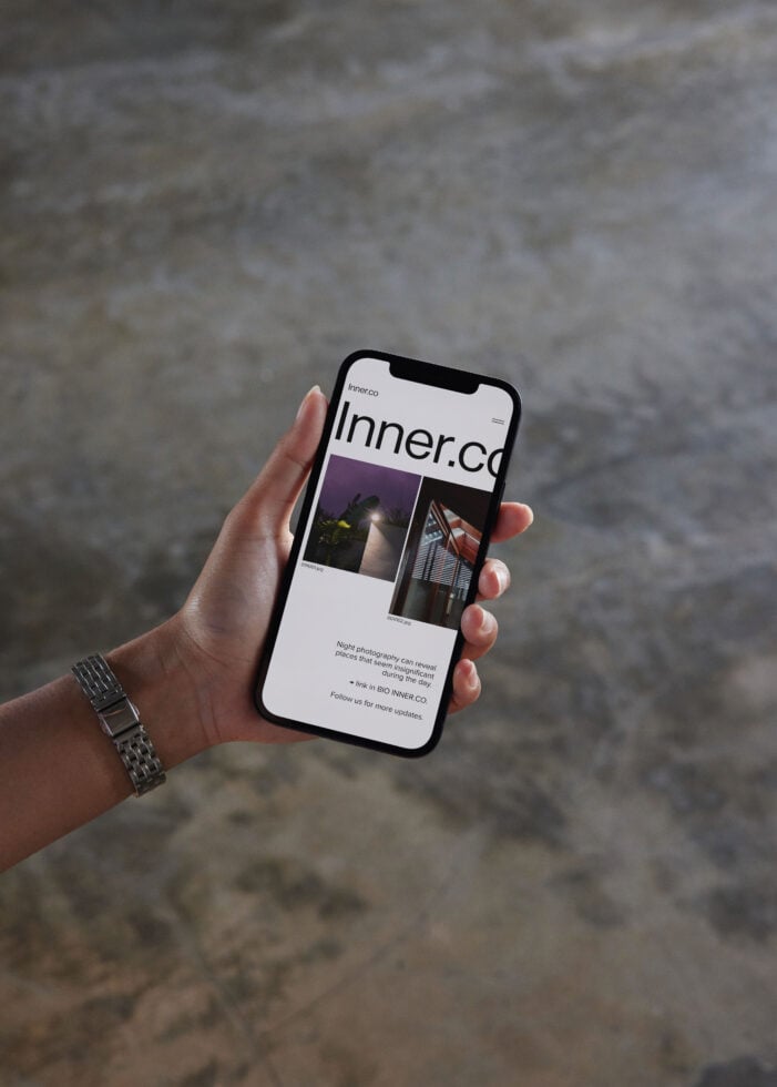 Inner.co website on phone showing night photography portfolio with images