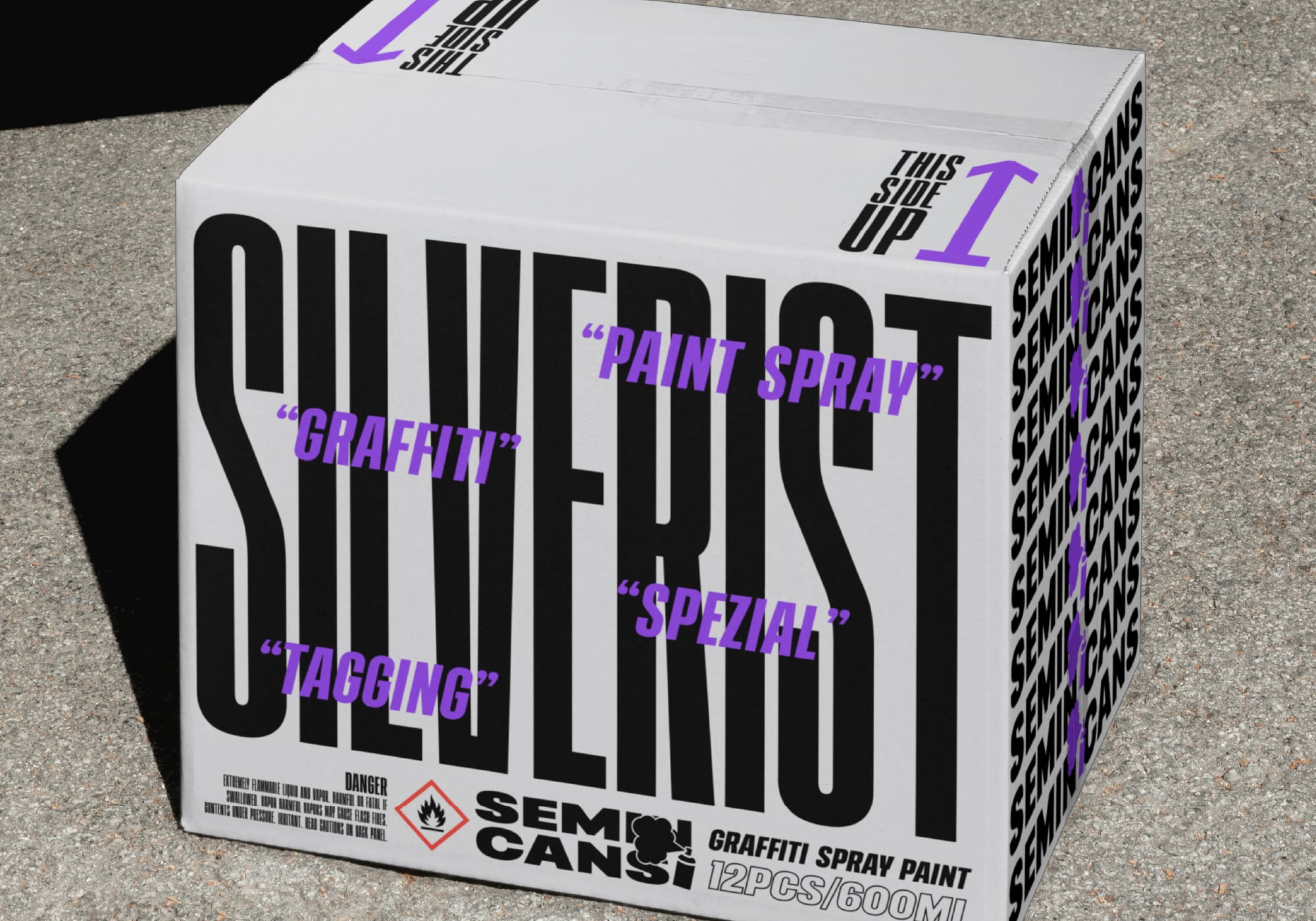 White spray paint box with bold black letters, purple accent text on multiple sides