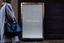 Street display case with soft gray screen, gold frame, black brick