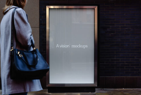 Street display case with soft gray screen, gold frame, black brick