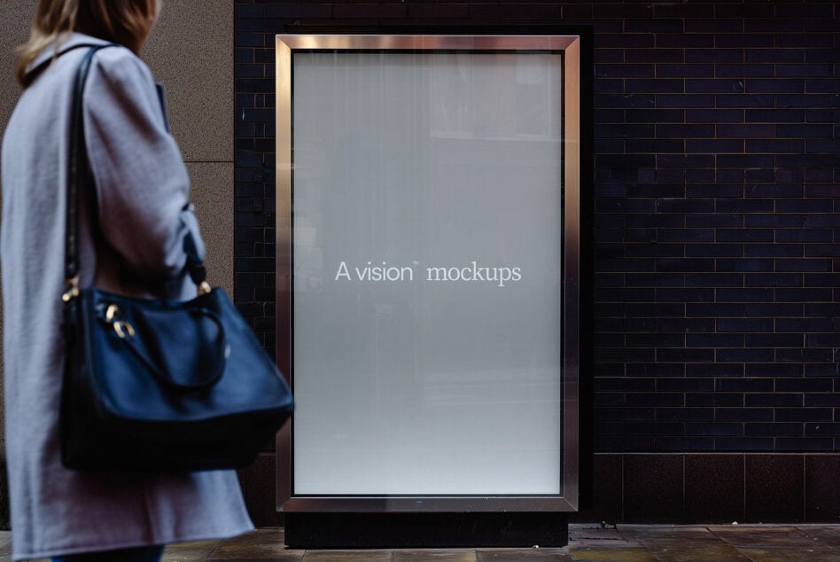 Street display case with soft gray screen, gold frame, black brick