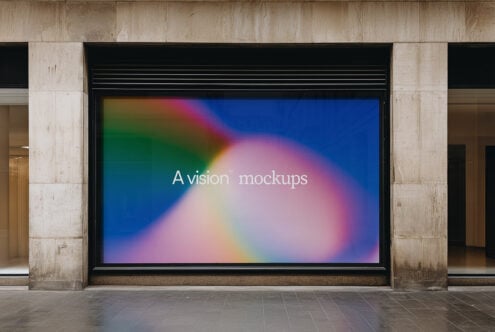 Wide storefront billboard with colorful gradient displaying A vision mockups branding