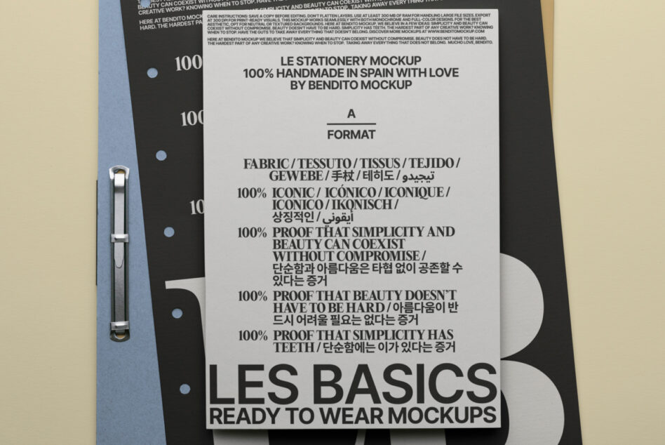 Blue folder with black ring binder holding stationery mockup with Les Basics typography