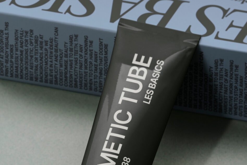 Dark METIC TUBE cosmetic packaging mockup angled against light surface