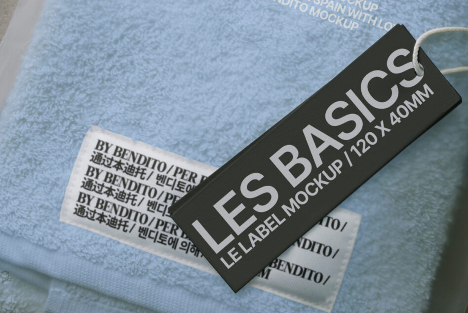 Black woven label mockup on blue folded fabric with text details