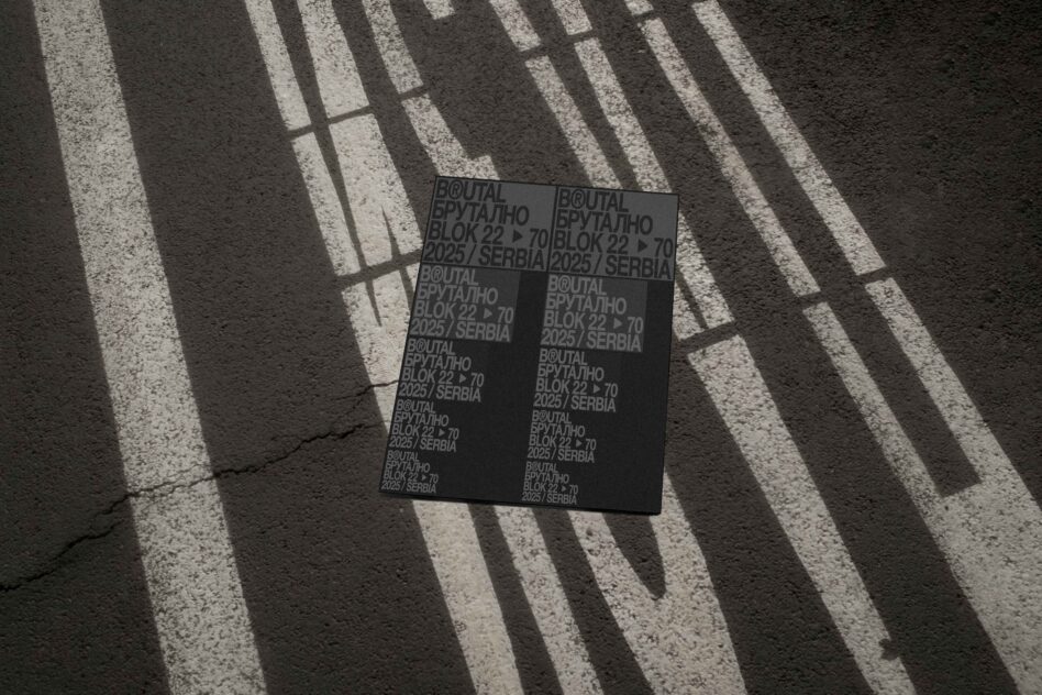 Black poster mockup on pavement with dramatic striped window shadows