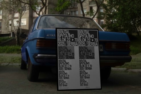 Blue 80s sedan with oversized poster mockup featuring repeating Cyrillic text