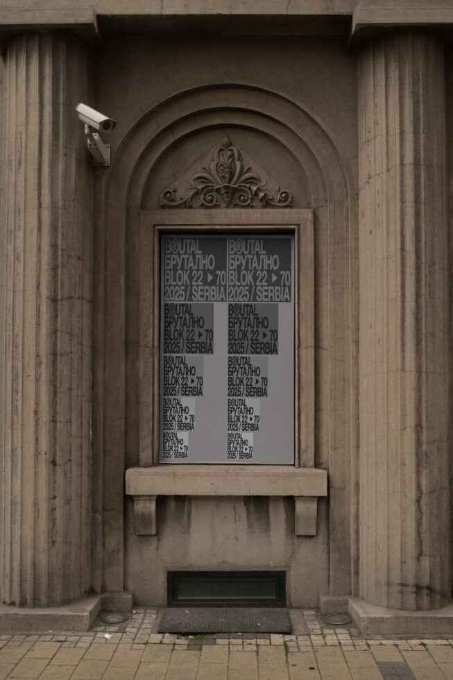 Ornate archway window display with repeated text layout