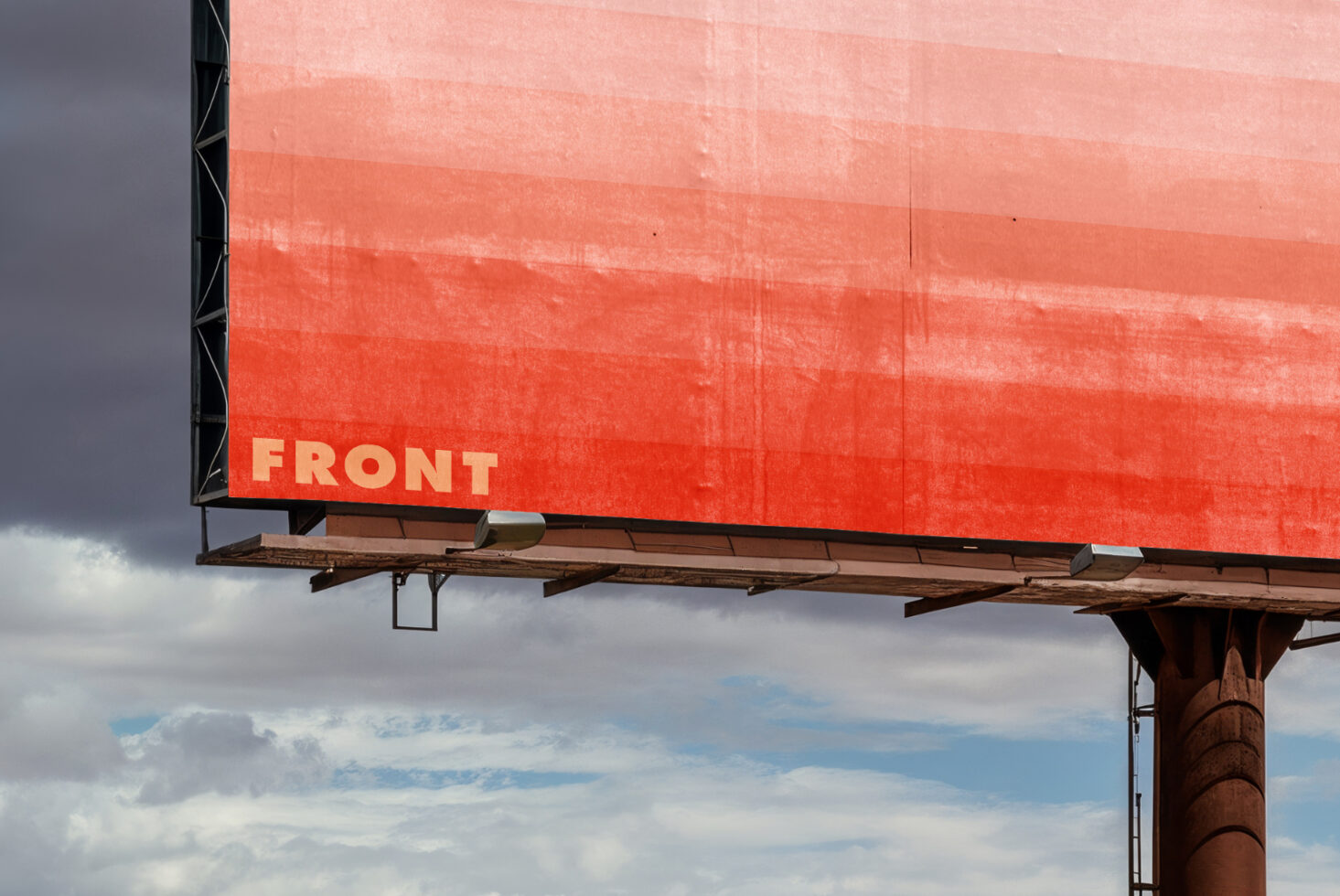 Red gradient billboard mockup with front label in desert setting with clouds