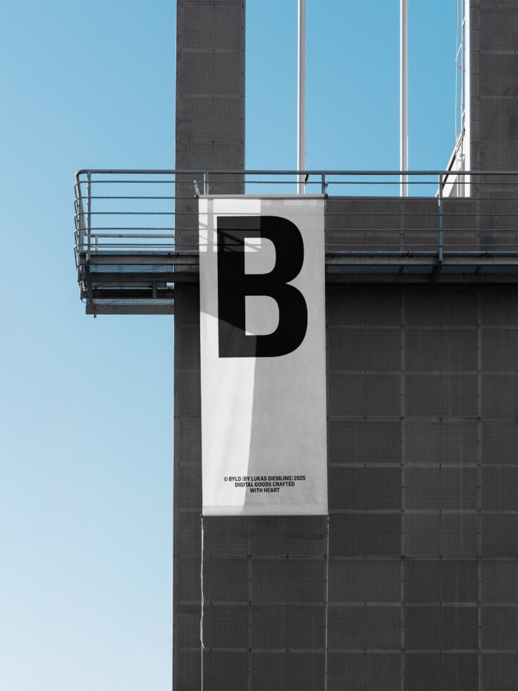 Light gray banner with black B letter mounted on building exterior