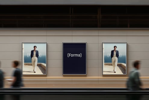 Three framed prints on gallery wall alternating between navy Forma posters, people walking by